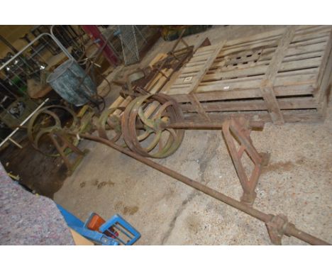 A Vintage spindle and pulley system, ex stationery engine