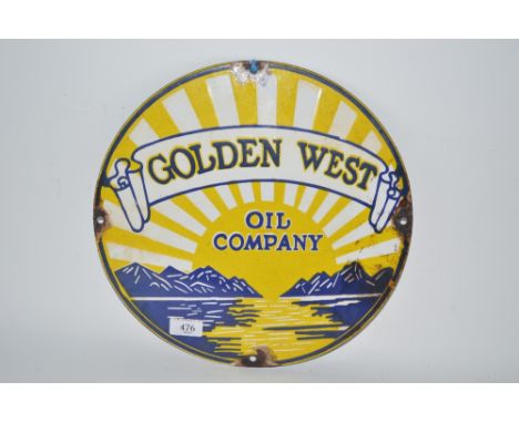 A circular enamel advertising sign for "Golden West Oil Company", 14ins dia. approx.