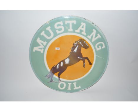 An enamel "Mustang Oil" circular advertising sign, 30ins dia. approx.
