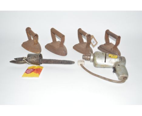 Four various Vintage flat irons; a Vintage drill and an unusual iron tool, use unknown