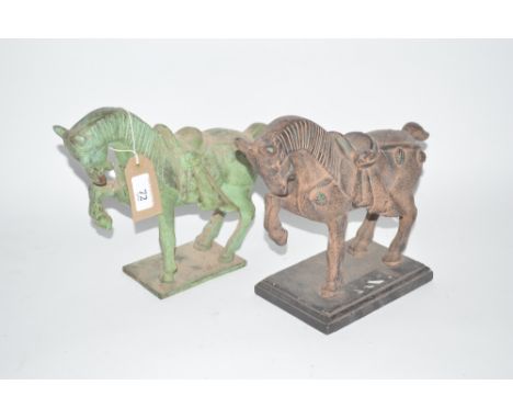 A bronze classical horse figure and a cast iron similar on wooden plinth