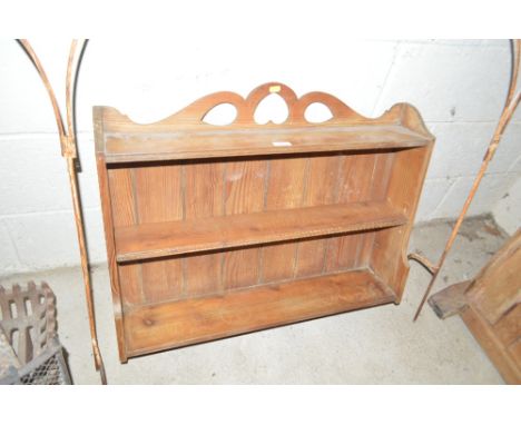 An Antique stripped pine hanging wall shelf