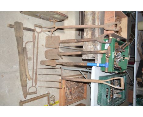 A quantity of various old wooden handled hand tools, dippers etc.