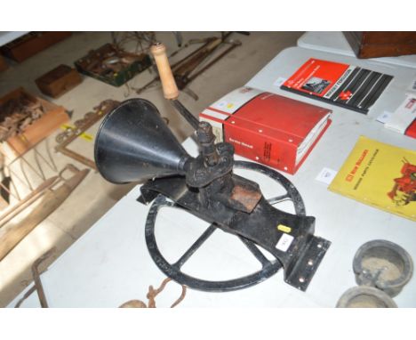 A vintage coffee grinder by John A Gilbert
