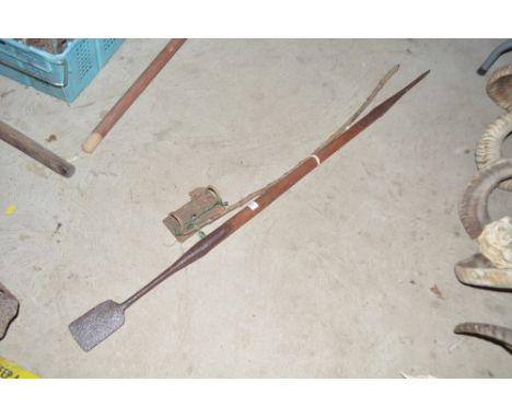 A Vintage mole trap and a mole spade