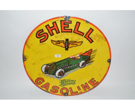 A circular enamel advertising sign for "Shell Gasoline", 24ins dia. approx.