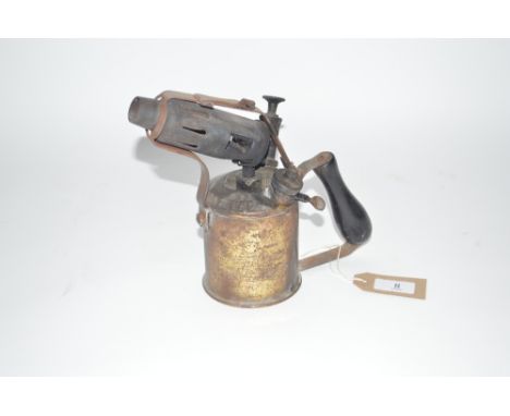 A Vintage brass blow lamp