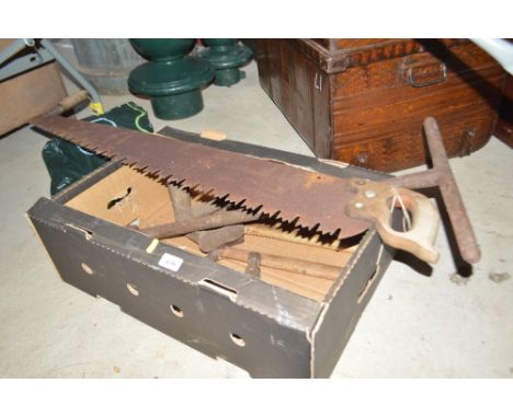 A Vintage cross-cut saw, a last and various other tools