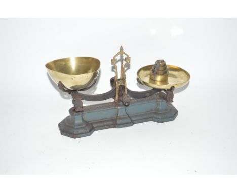 A set of W. &amp; T. Avery cast iron and brass scales with weights