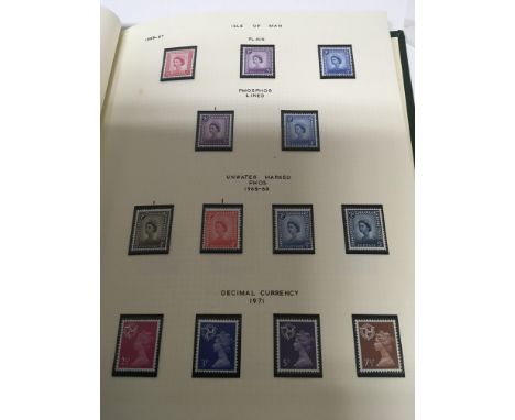 A collection of four stamp albums including QEII Channel Islands stamps and two albums of British Decimal stamps all unused. 