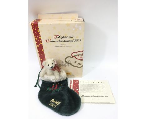 A small, limited edition 2005 Steiff 'Christmas bear with stocking', boxed with certificate.Approx 14cm