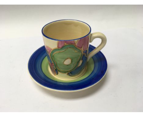 A Clarice Cliff coffee can and saucer with blue chintz pattern