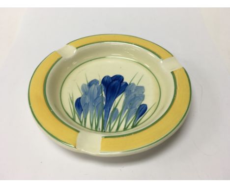 A Clarice Cliff ash tray decorated in spring crocus