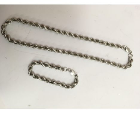 A silver rope chain necklace and bracelet.Approx 69g