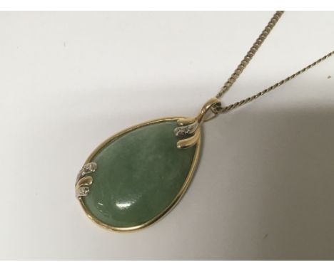 A 14carat gold and jade pendent on a 9carat gold necklace. Chain weight without pendent 4.5g