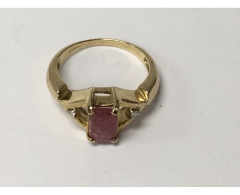 A 9 ct gold ring inset with ruby and diamonds size O