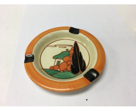 A Clarice Cliff ash tray decorated with the house and tree pattern 12 cm