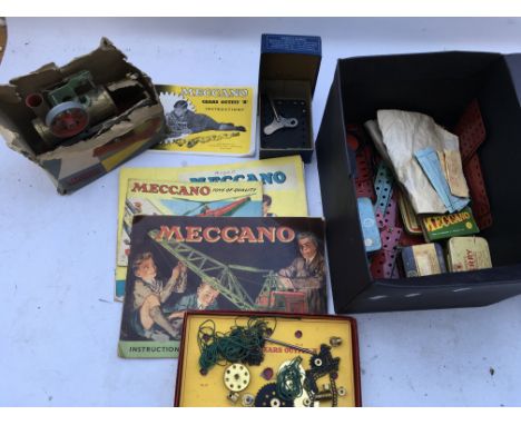 Meccano, box of good condition loose Meccano , many parts, gears , clockwork motor and manuals, also included is a Mahmoud st