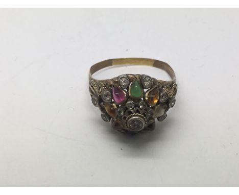 A 14k gold multi stone ring, approx 4.3g and approx size R.