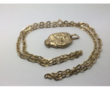 A gold nugget pendant on a 9ct gold chain, approx 57g.