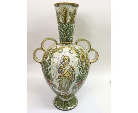 An impressive, Italian Cantagalli maiolica vase, of bulbous form with narrow back and scrolled handles, decorated with a Clas