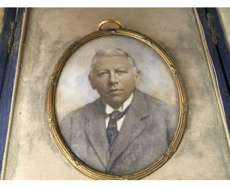 A framed 19th Century portrait watercolour miniature on ivory depicting a Gentleman. 8cm.