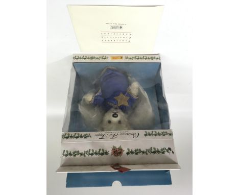 A limited edition, Steiff 'Christmas Tree Topper' comprising a white plush 'angel' bear in blue robe, with certificate.Approx