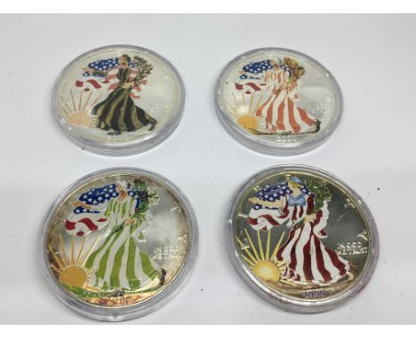 A collection of four Themed American 1999 and 2000 Silver Dollars enamel decorated and each with an individual American Lady 