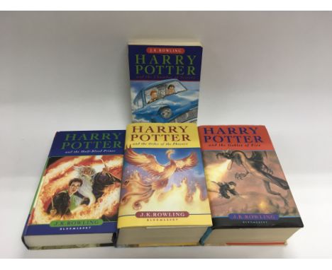 Four Harry Potter books comprising three First Editions.