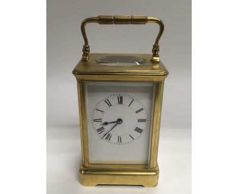 A French brass repeater carriage clock.