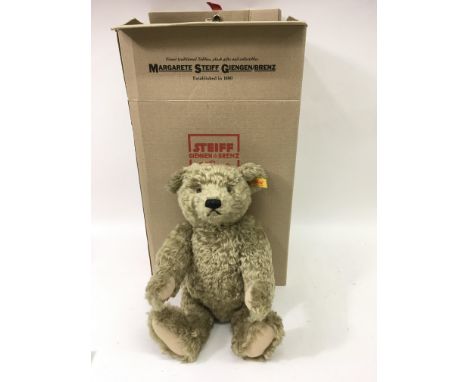 A boxed Steiff bear with growler.Approx