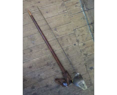 A George V Infantry Officer's sword, with leather handle and scabbard, blade features worn, as found