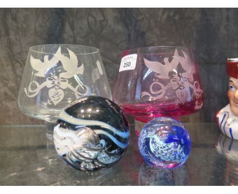 A vintage Caithness 25 year wedding anniversary bowl, together with 40 year ruby bowl and 'moon crystal' paperweight, and a s