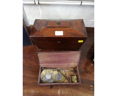 A 19th century mahogany sarcophagus form tea caddy with pad feet 28cm wide, and a set of brass balances (2)