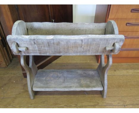 A wooden garden trough, 76cm long, 68cm high and 30cm deep