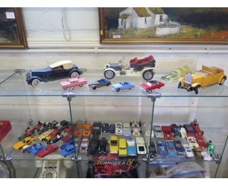 Fifty-four diecast cars by various makers including Dinky early-post war grey and blue 38e Armstrong Siddeley Coupe, 106 Aust