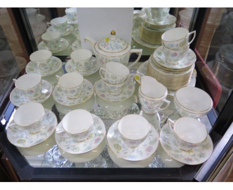 A Minton Vanessa pattern part tea service with teapot and two serving plates, 41 pieces