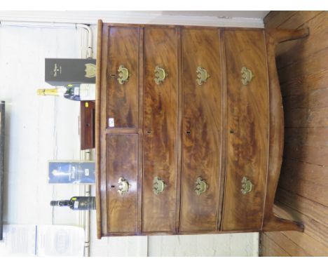 An early 19th century mahogany bowfront chest of drawers, with two short and three long graduated drawers on outsplayed brack