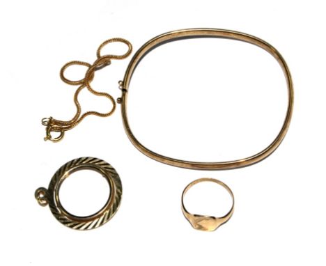 A 9 carat gold bangle, a 9 carat gold coin mount, a gold fine bracelet, etc