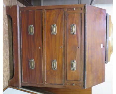 An Edwardian mahogany bureau, the sloping fall enclosing pigeonholes over three long graduated drawers on bracket feet, 76cm 