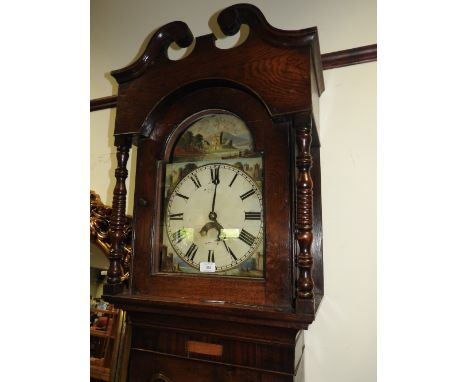 A late George III oak cased 30 hour longcase clock with arches white enamel dial over shaped trunk door