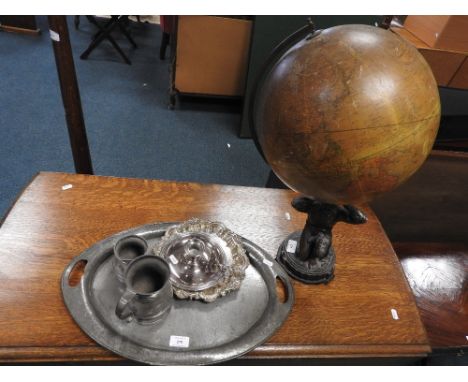 A Geographic 12 inch terrestrial globe (for restoration), a pewter tray and two tankards, a plated chamber stick and EPNS sal