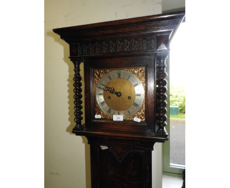 A Carolean style oak cased cottage longcase clock early 20th century, the silvered chapter ring marked Smart and Browne Ltd. 