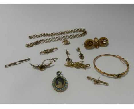 A citrine and seed pearl crescent bar brooch together with a further seed pearl bar brooch, a yellow metal chain, a yellow me