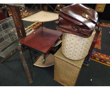 An artists easel on tripod base along with a leather brief case, a modern corner shelf unit, a Lloyd Loom linen basket etc 