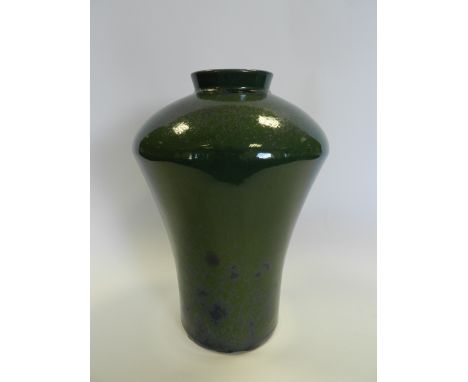 A high fired green and mottled blue high shouldered stone ware Art Pottery vase