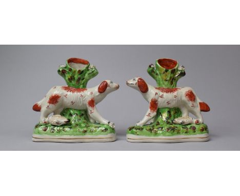 A Pair of Staffordshire Spill Vases in the Form of Spaniels Before Tree Trunk 