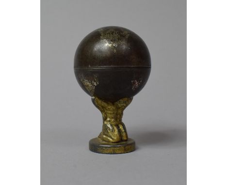 An Early 20th Century German Pencil Sharpener in the Form of Atlas Supporting Globe, 7cm high 