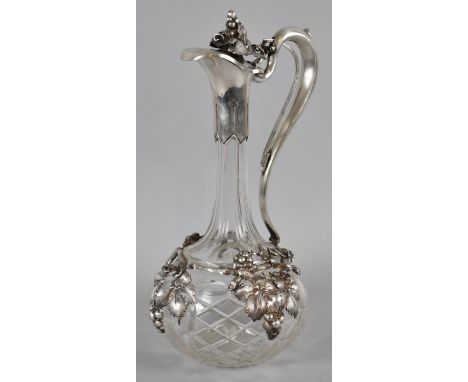 A Large Glass Globe and Stalk Claret Jug with White Metal Mounts in the Form of Vines and Leaves, Hinged Lid, 32cm high, Some