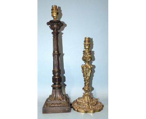 *Please note, all starred lots are sold at no reserve.*A bronze table lamp with urn sconce, on sectional column and square pl